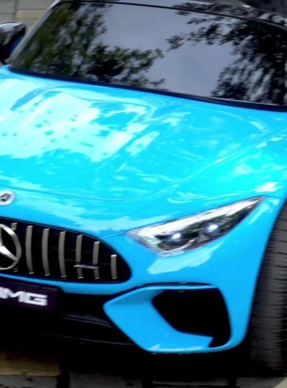 Дитячий двомісний повнопривідний електромобіль Bambi Mercedes-Benz AMG SL63 (MP3) з додатковими коліщадками та автофарбуванням, блакитний