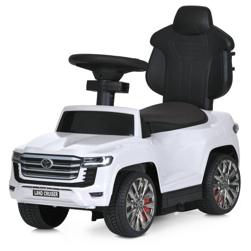 Дитячий толокар-електромобіль Bambi Toyota Land Cruiser 300 (MP3) з батьківською ручкою та пультом керування, білий