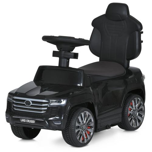 Дитячий толокар-електромобіль Bambi Toyota Land Cruiser 300 (MP3) з батьківською ручкою та пультом керування, чорний