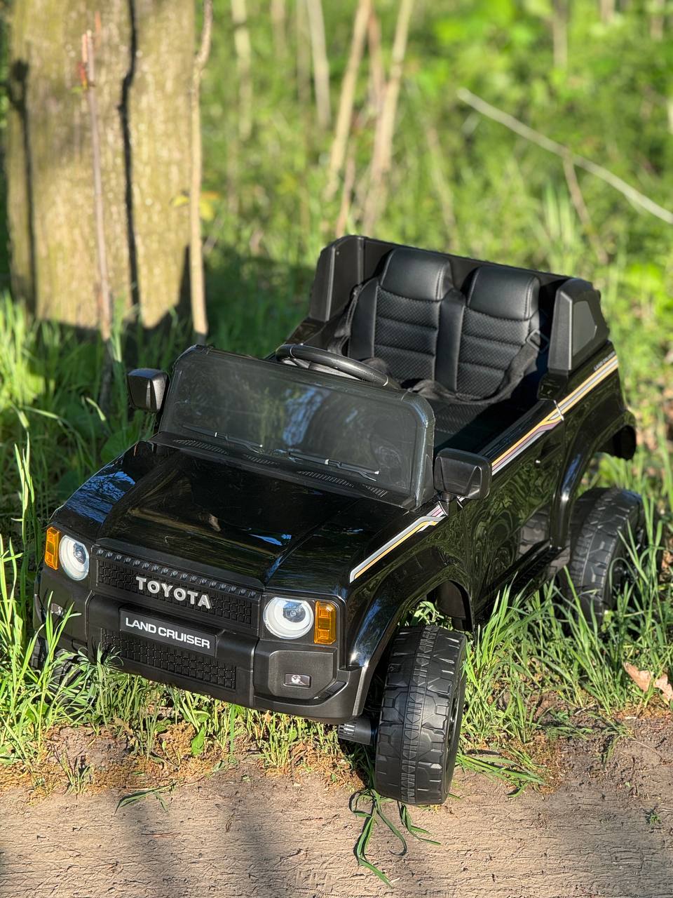 Дитячий електромобіль Toyota Land Cruiser, повнопривідний джип, чорний